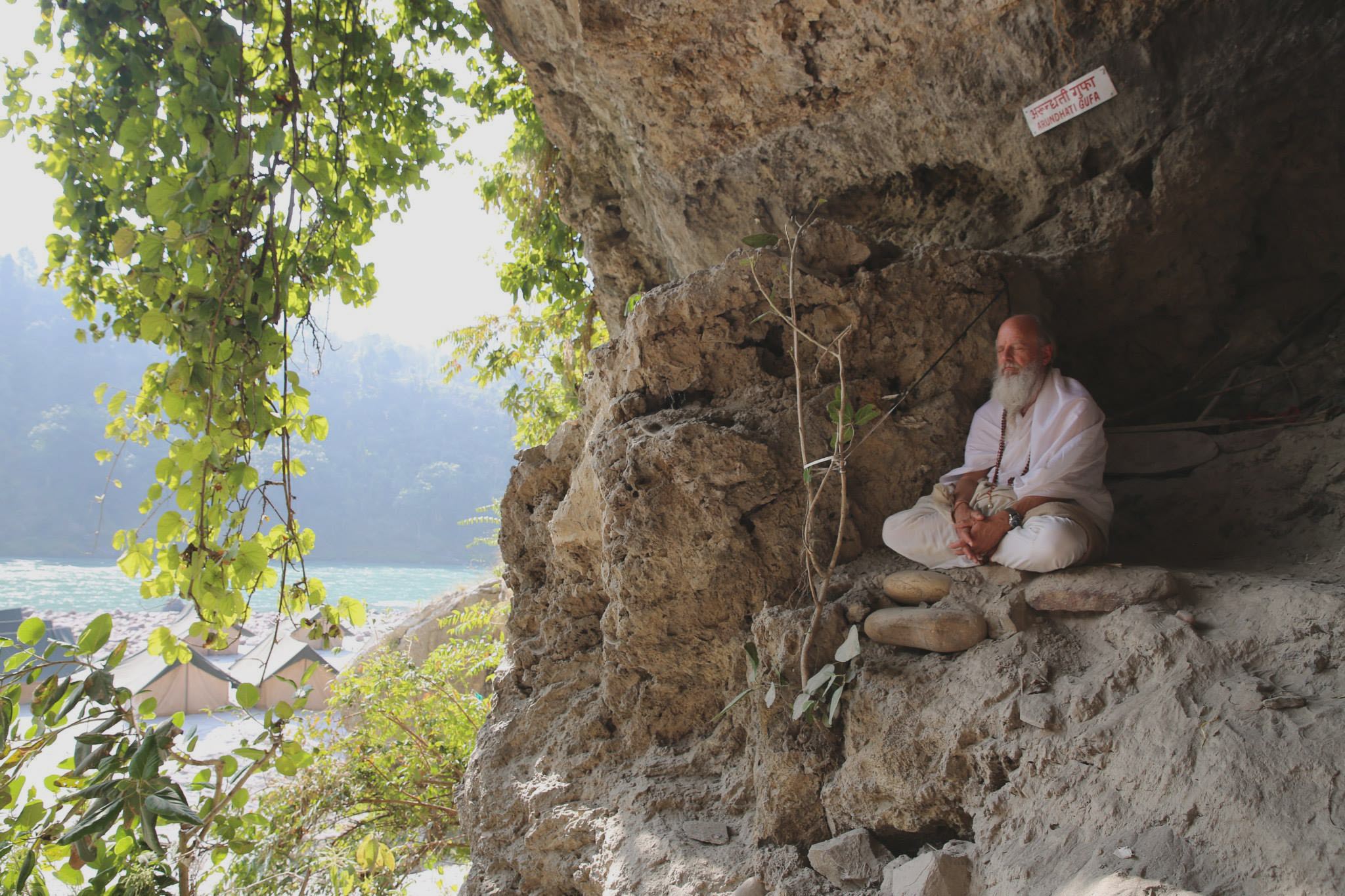 Thom Knoles perched inside a rock