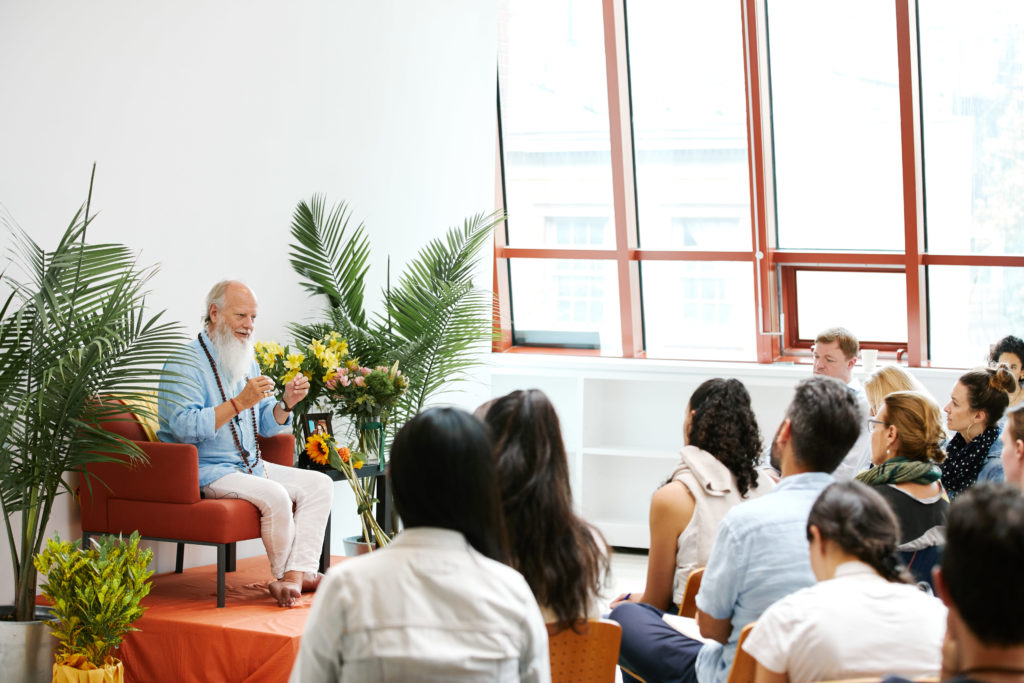 Thom Knoles teaching a group of people who've signed up for his Vedic Meditation subscription