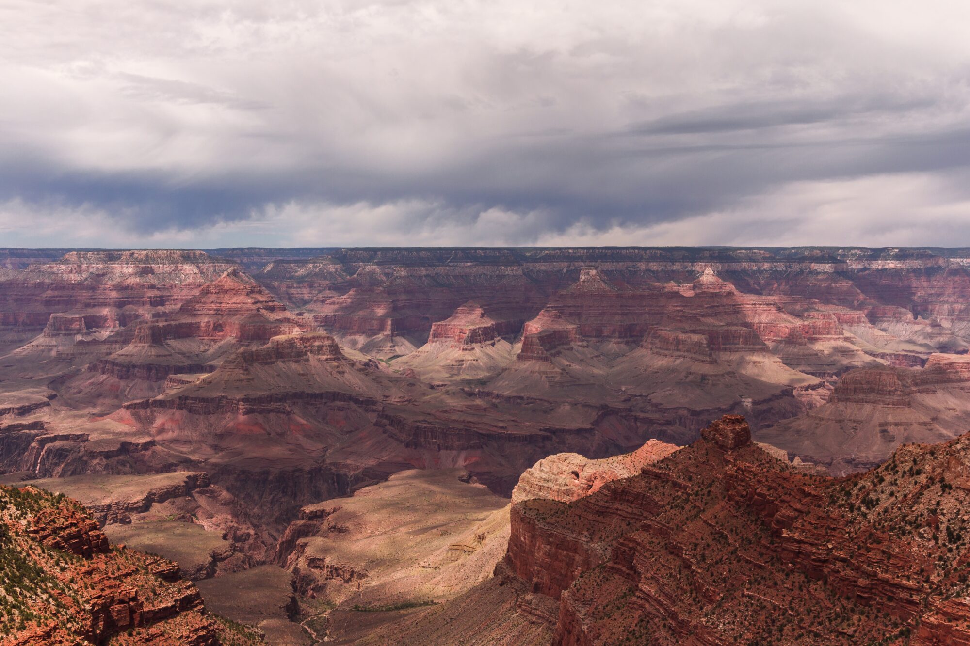 scenic image of canyon under an ominous sky
