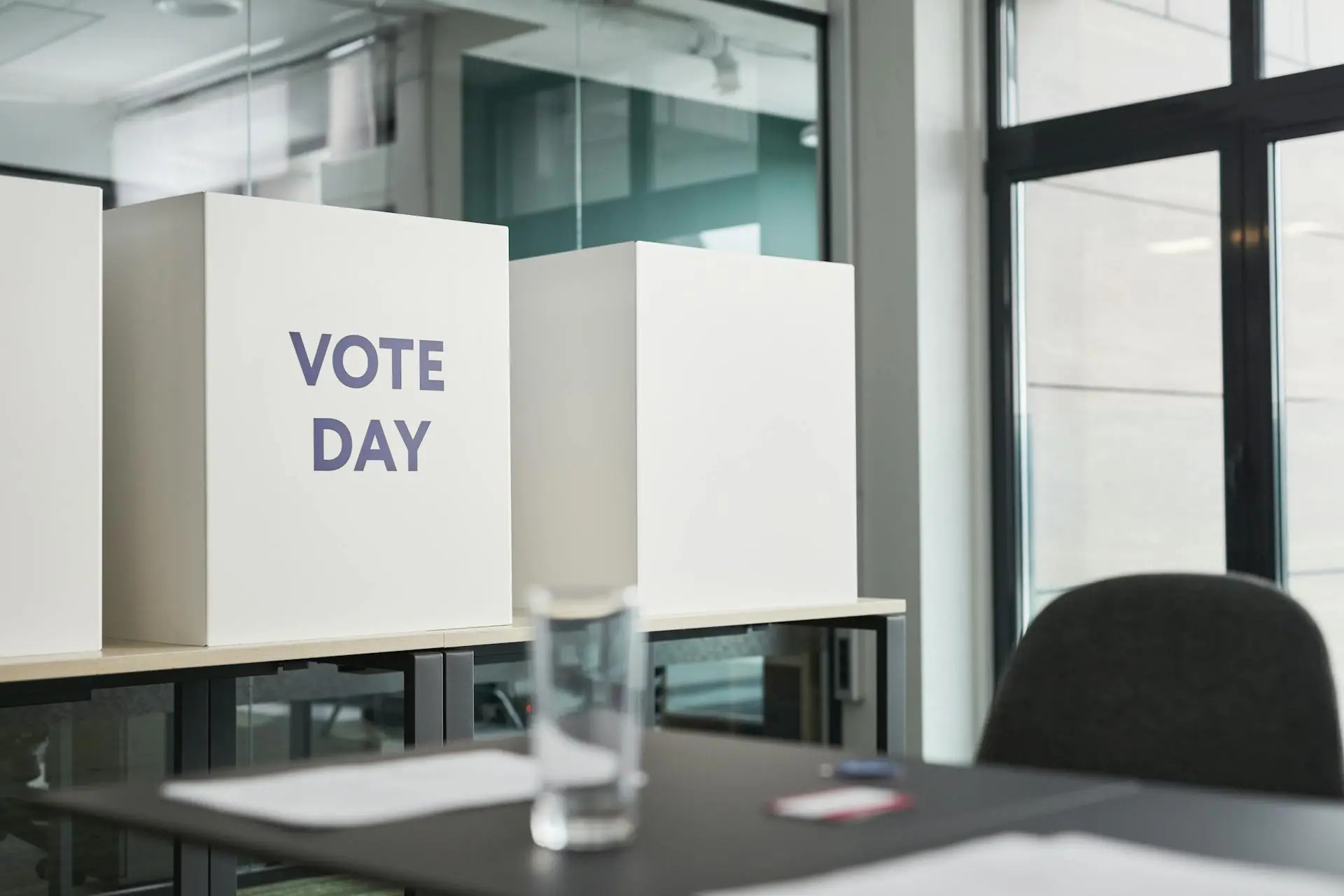 white ballot boxes on election day