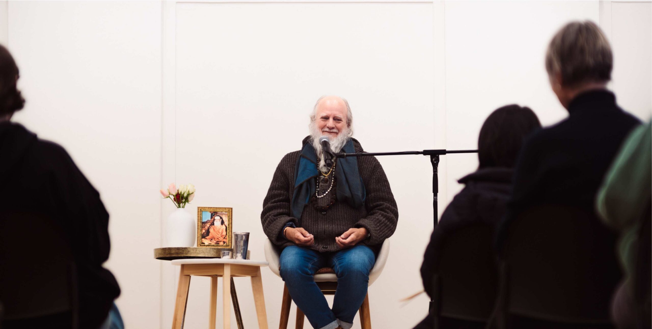 Thom Knoles speaking infront of audience